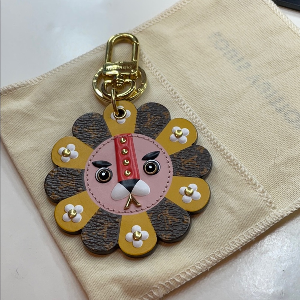 LV lion charm